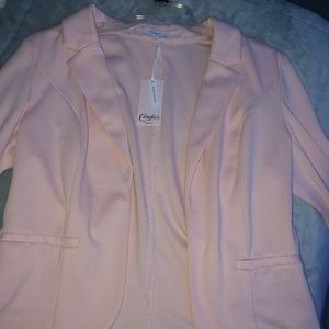 Candie’s light pink blazer